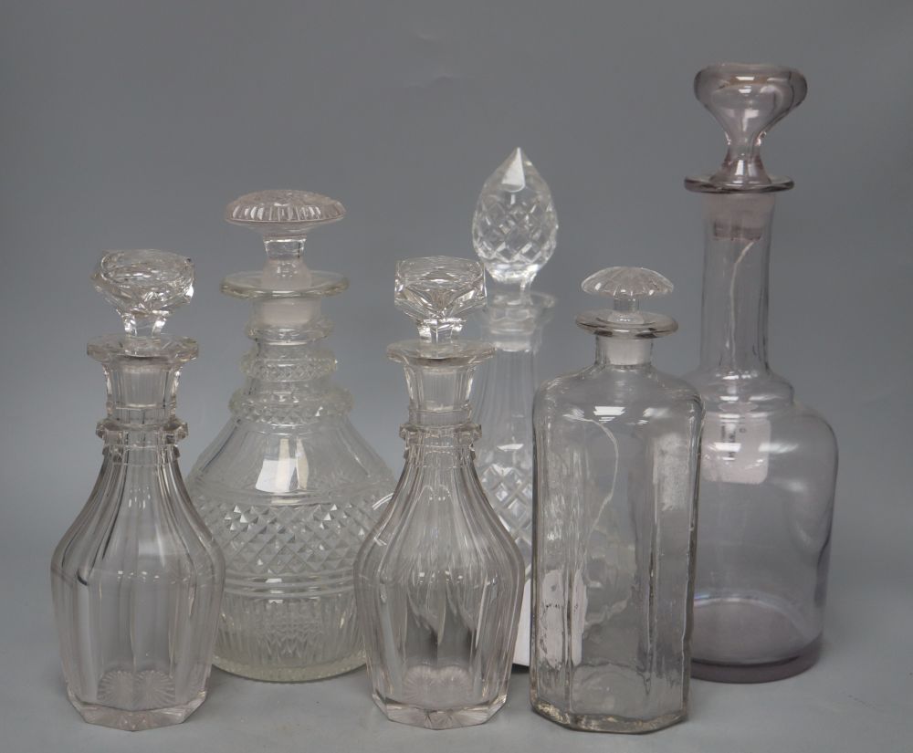 A pair of 19th century cut glass decanters and stoppers, height 23cm and four other decanters